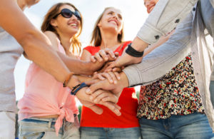 A group of women are together. This reflects concepts of therapy in Encinitas, CA. Our therapists in Encinitas, CA are able to provide therapy for women and postpartum therapy.