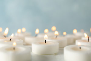 Candles are displayed. This reflects concepts discussed in grief counseling in San Diego, CA with Headway Therapy. 